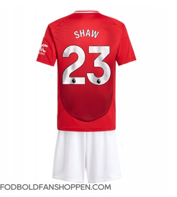 Manchester United Luke Shaw #23 Hjemmebanetrøje Børn 2024-25 Kortærmet (+ Korte bukser)